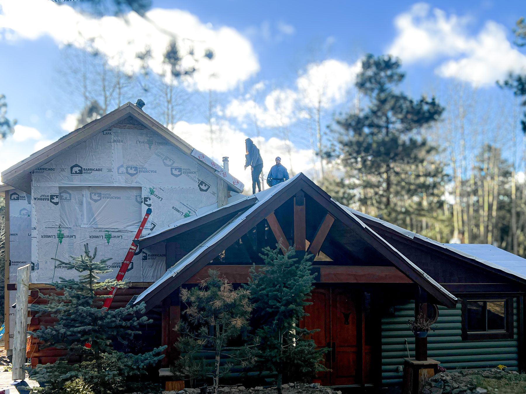 Lotus Services on the roof during a scope writing job in colorado